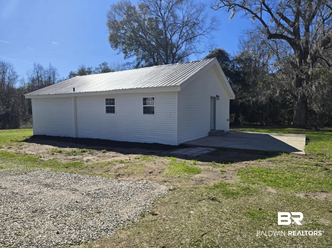 821 Dailey Street Brewton, AL 36426 - Photo 3 of 17 View of garage