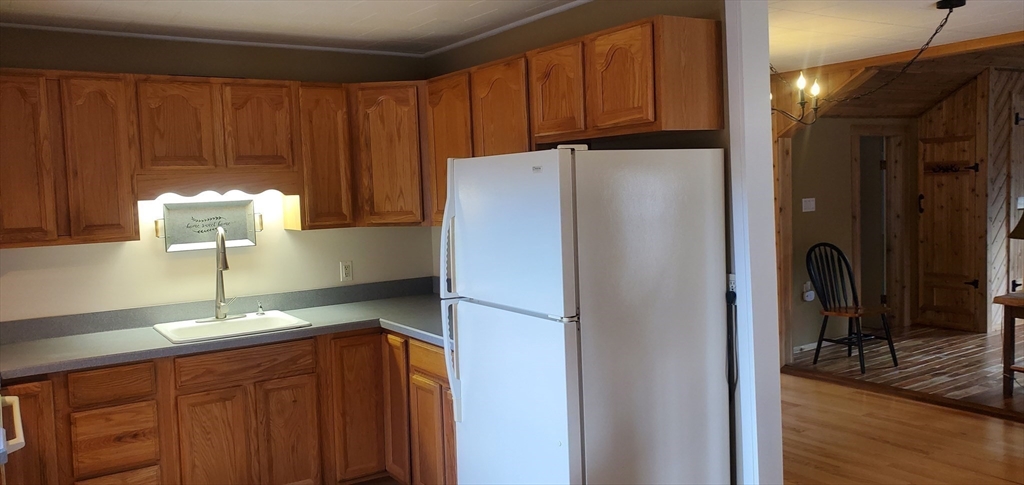 7 Strong Road Southampton, MA 01073 - Photo 28 of 42 a kitchen with stainless steel appliances granite countertop a refrigerator and a sink
