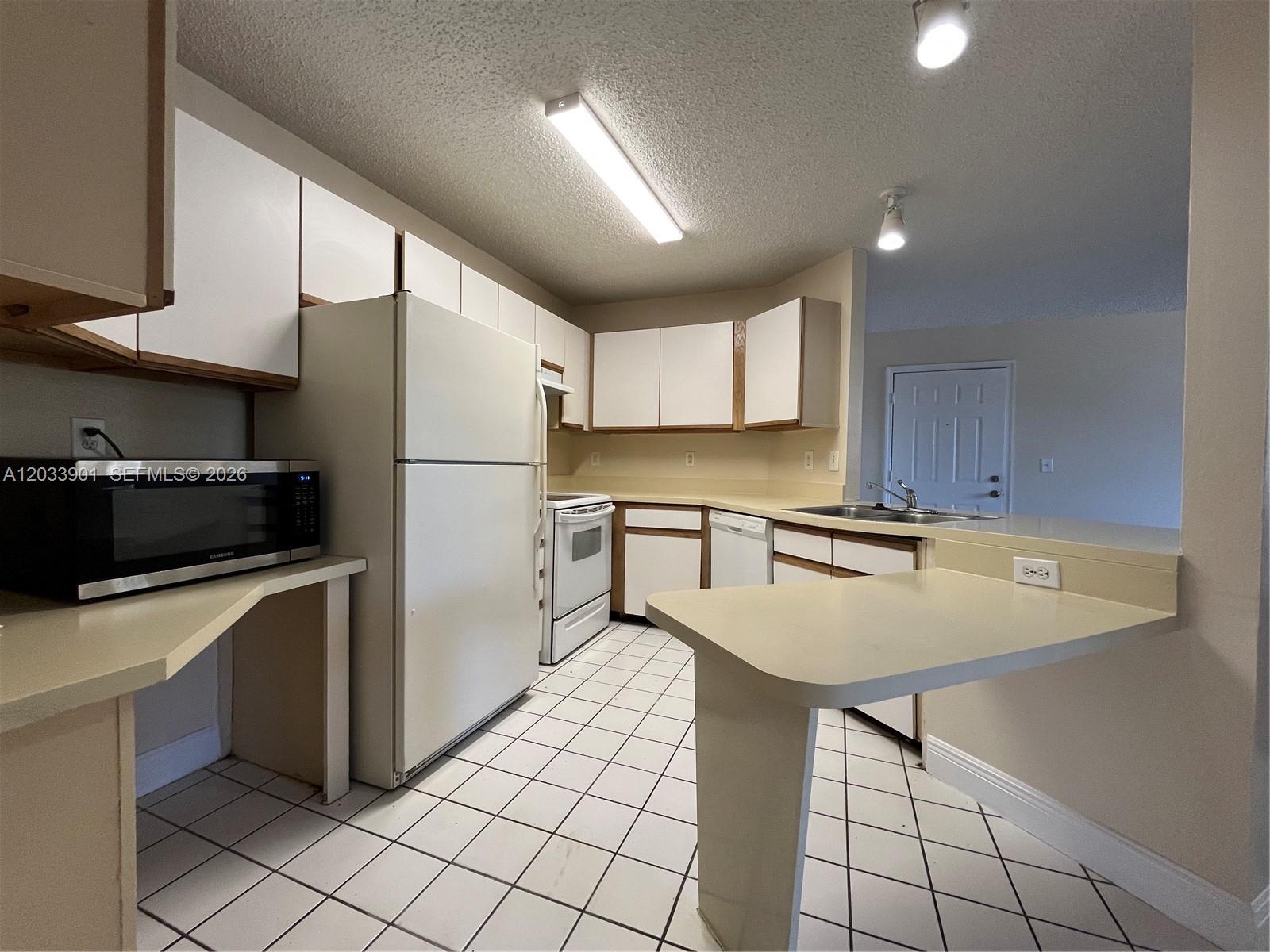 4015 West McNab Road, Unit D212 Pompano Beach, FL 33069 - Photo 2 of 20