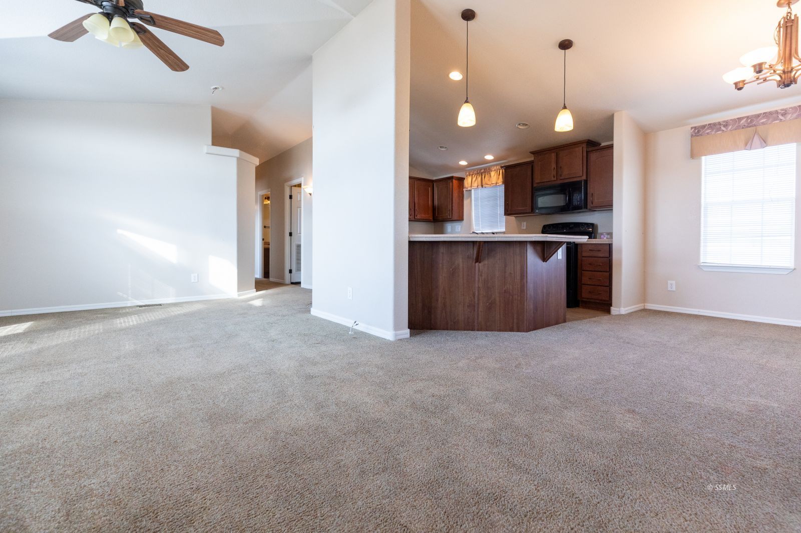 957 East Springer Avenue Ridgecrest, CA 93555 - Photo 6 of 31 a view of kitchen and refrigerator in a room