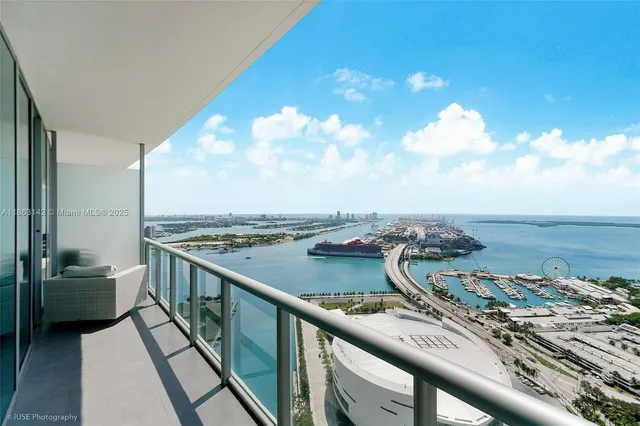 a view of a balcony next to a city view