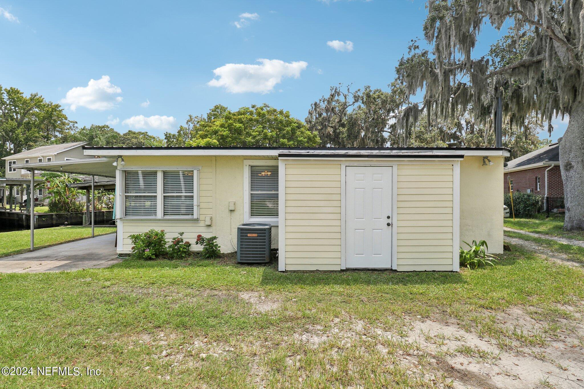 2870 Adams Road St. Augustine, FL 32092 - Photo 7 of 31 a view of a house with a yard