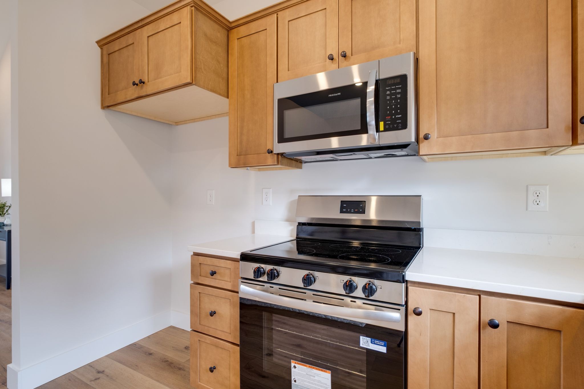 1280 Old County House Road Charlotte, TN 37036 - Photo 11 of 26 a kitchen with a stove and a microwave