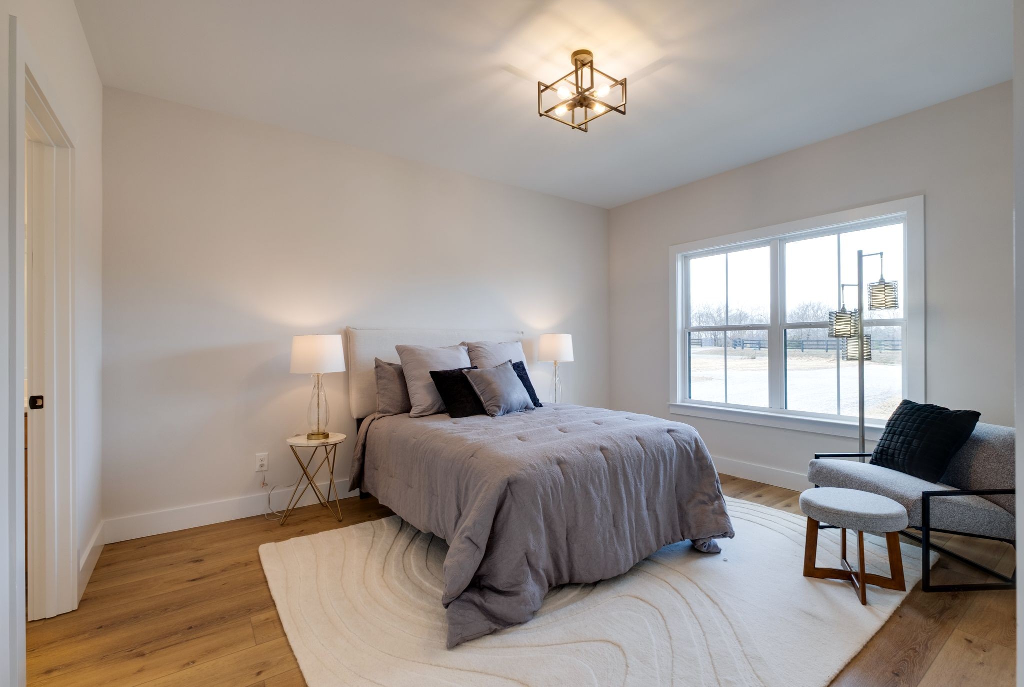 1280 Old County House Road Charlotte, TN 37036 - Photo 12 of 26 a bedroom with a bed and a couch