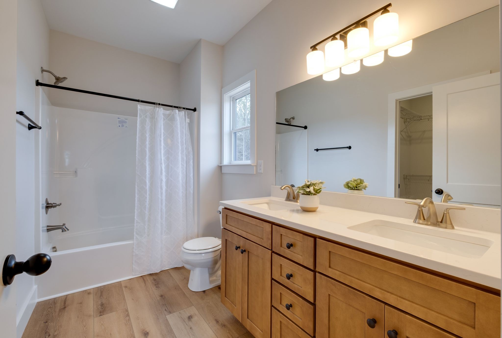 1280 Old County House Road Charlotte, TN 37036 - Photo 14 of 26 a bathroom with a sink double vanity and a mirror