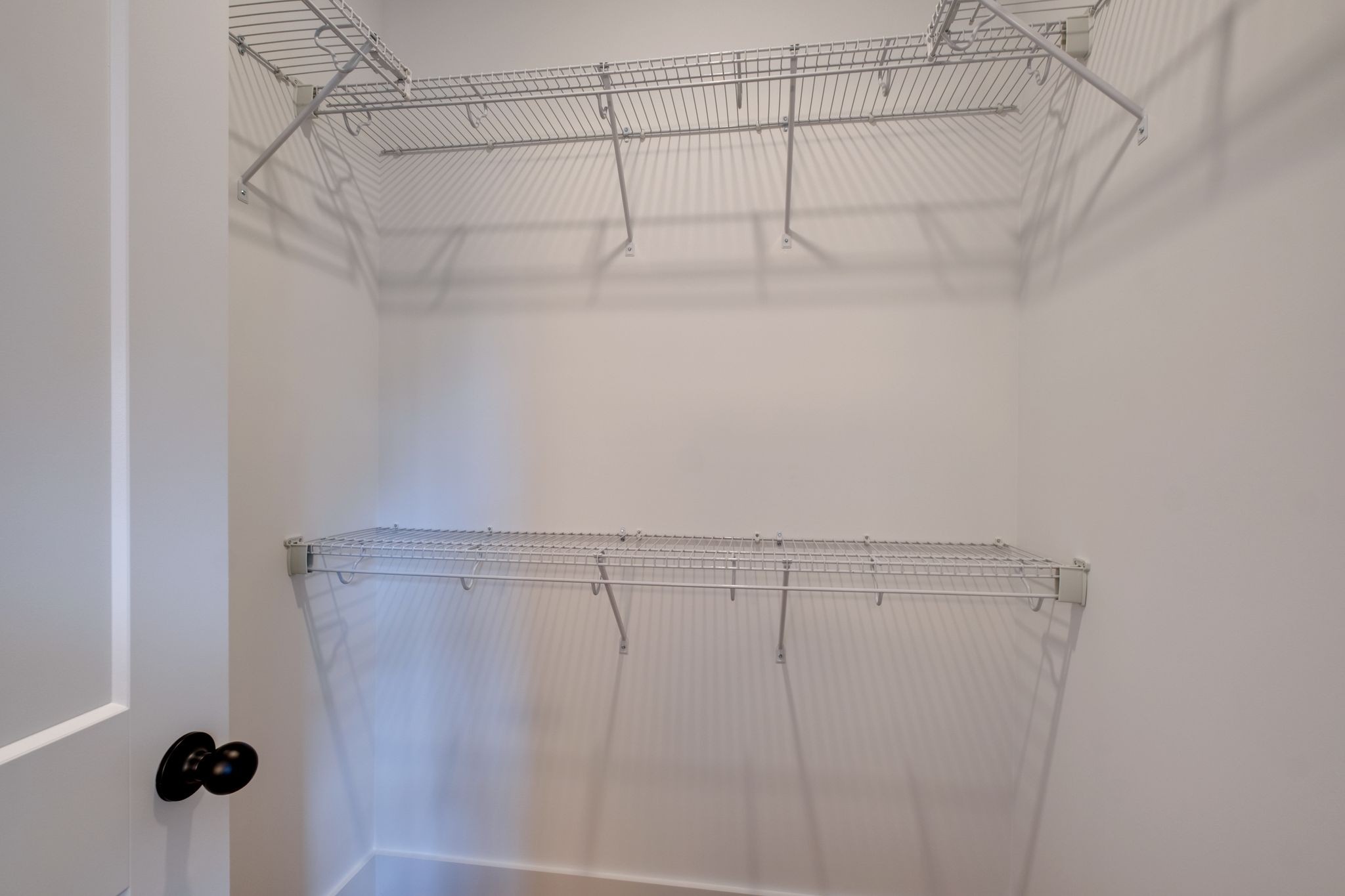 1280 Old County House Road Charlotte, TN 37036 - Photo 15 of 26 a view of a room with racks on the wall