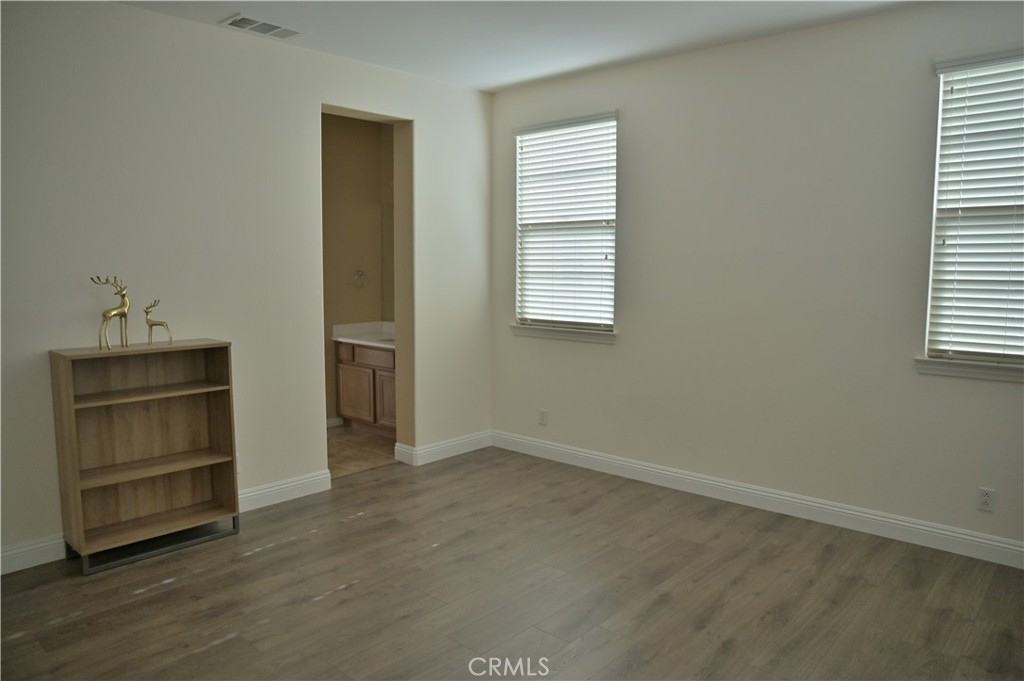 7112 Acorn Place Rancho Cucamonga, CA 91739 - Photo 30 of 40 a view of an empty room with a window
