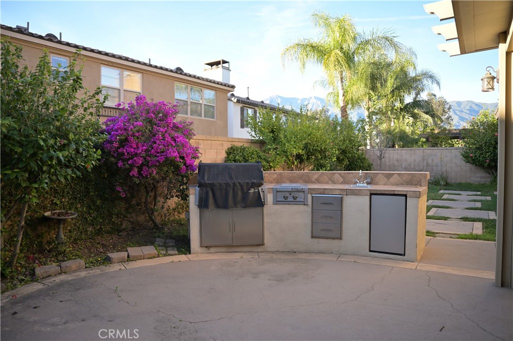 7112 Acorn Place Rancho Cucamonga, CA 91739 - Photo 32 of 40 a view of a house with a street