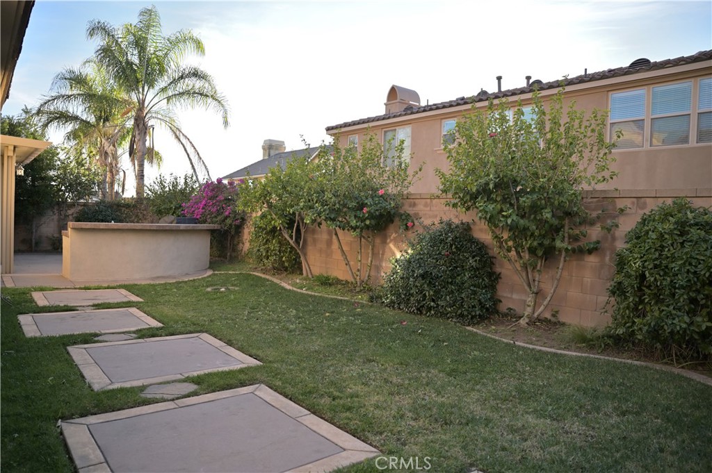 7112 Acorn Place Rancho Cucamonga, CA 91739 - Photo 34 of 40 a view of a yard in front of a house with a yard