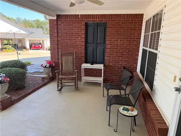 a building outdoor space with patio furniture