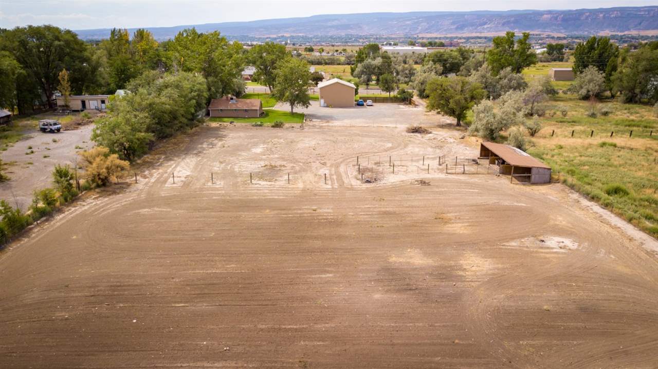 2390 H Road Grand Junction, CO 81505 - Photo 40 of 42 a view of a road with a yard