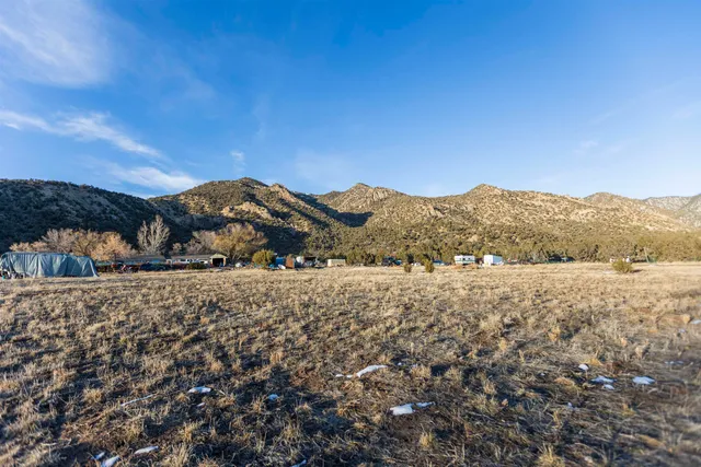 a view of mountain view with mountains in the background
