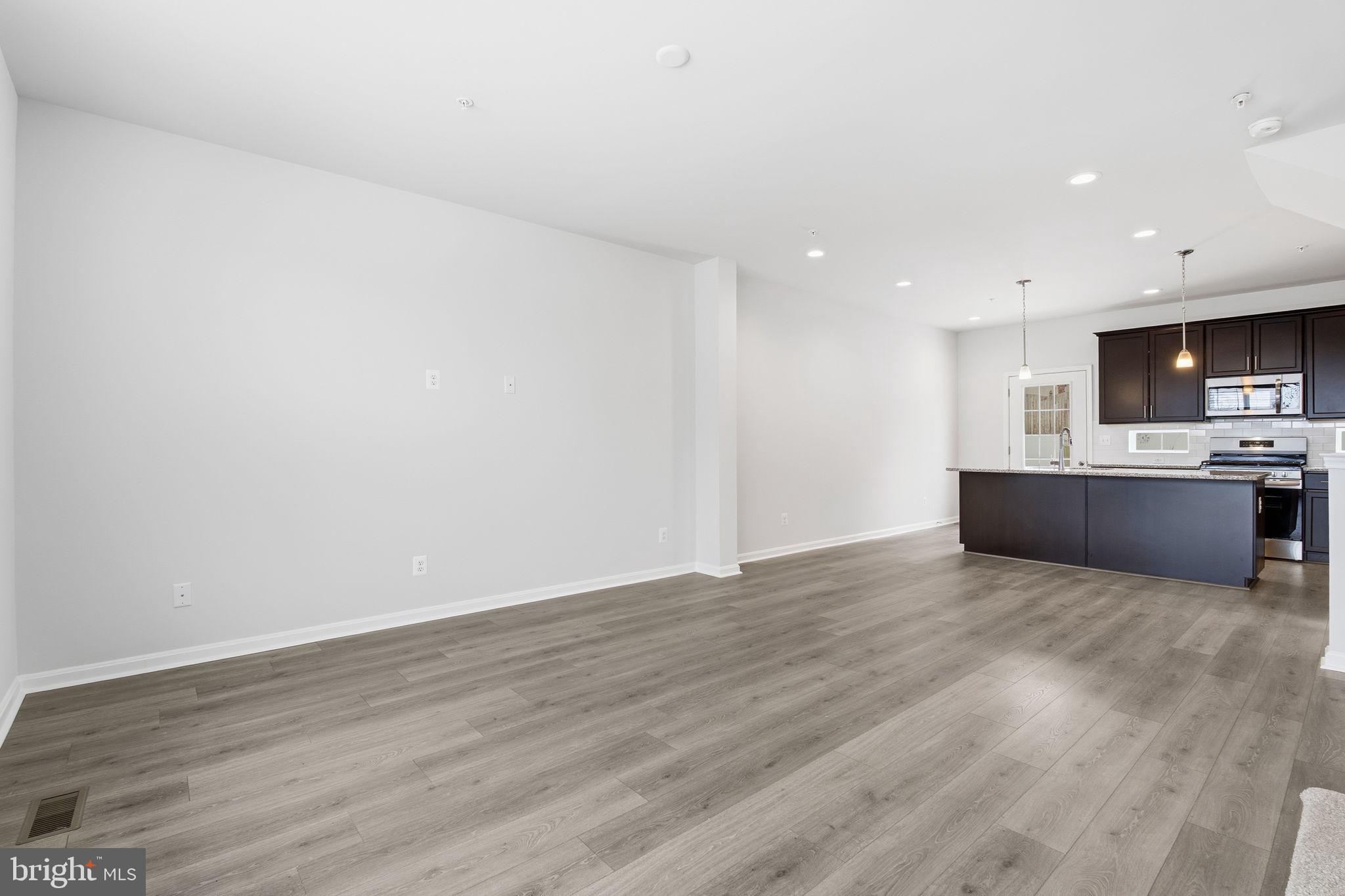 345 Tumblers Way, Unit 20 Joppa, MD 21085 - Photo 11 of 34 a view of kitchen with wooden floor