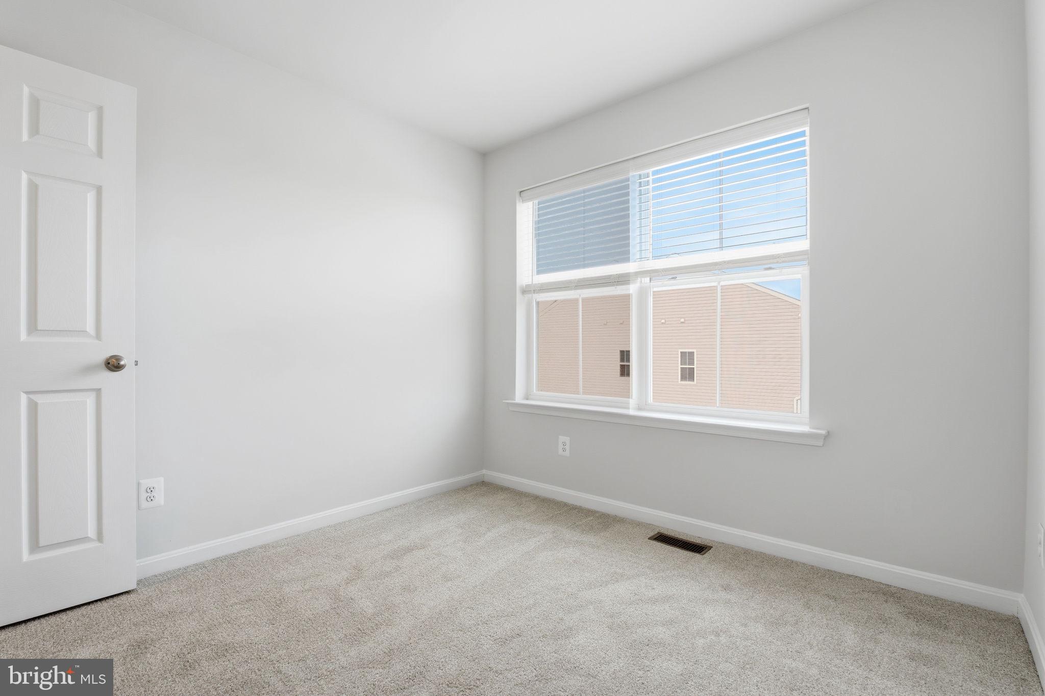 345 Tumblers Way, Unit 20 Joppa, MD 21085 - Photo 18 of 34 an empty room with window