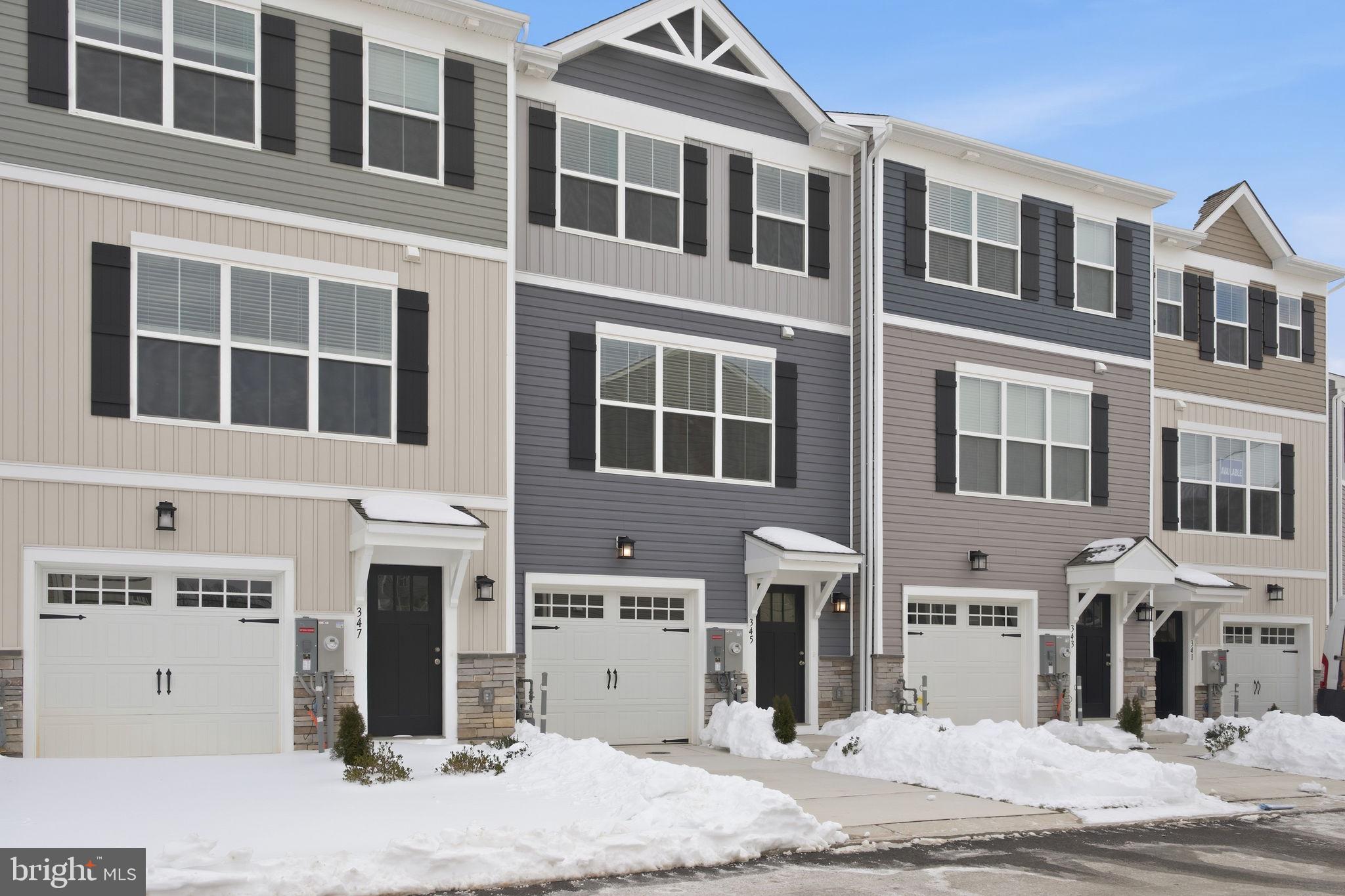 345 Tumblers Way, Unit 20 Joppa, MD 21085 - Photo 2 of 34 a front view of a building with a swimming shower