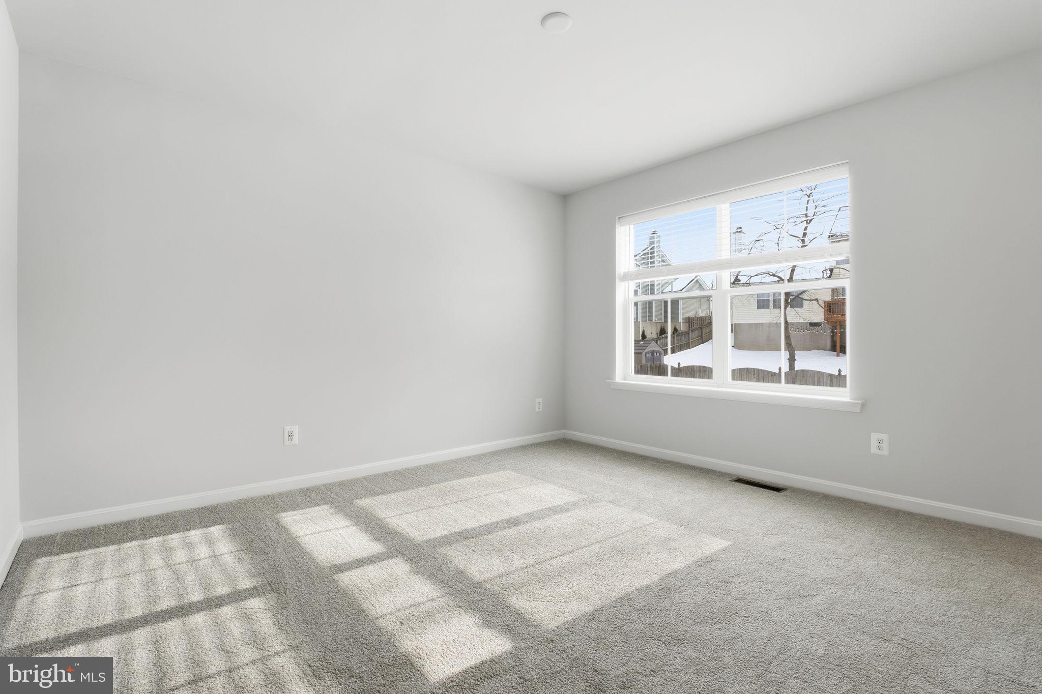 345 Tumblers Way, Unit 20 Joppa, MD 21085 - Photo 21 of 34 a view of an empty room with a window