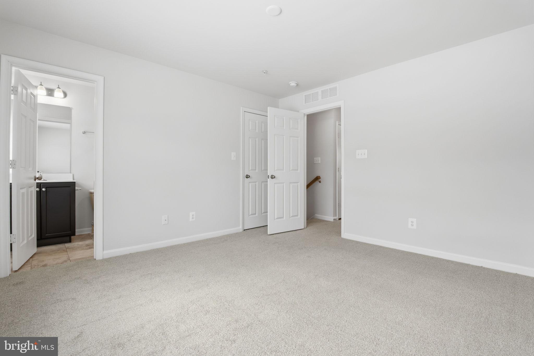 345 Tumblers Way, Unit 20 Joppa, MD 21085 - Photo 22 of 34 an empty room with closet area