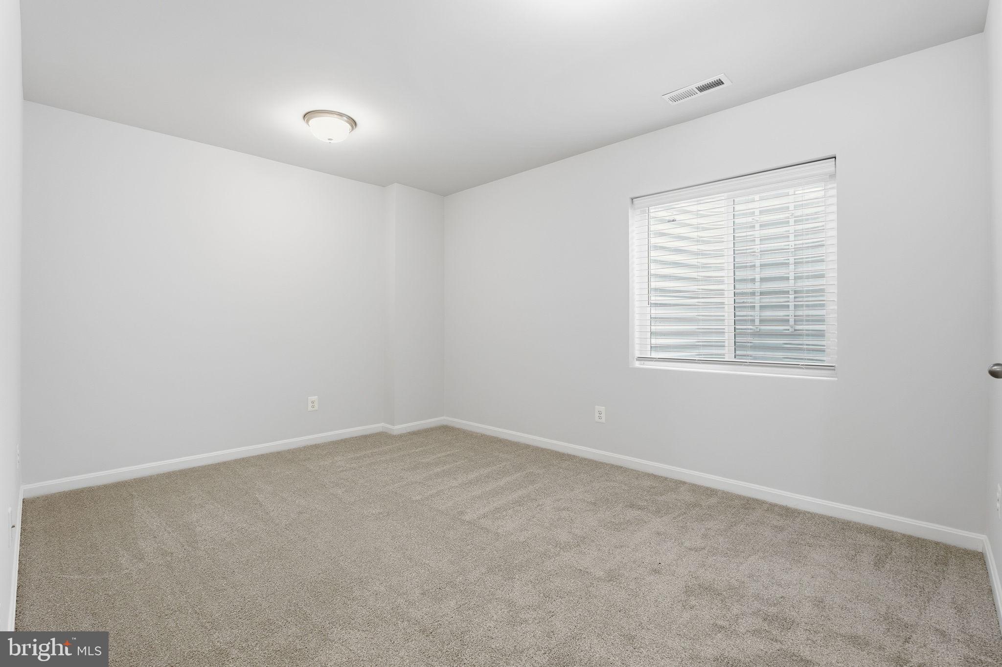 345 Tumblers Way, Unit 20 Joppa, MD 21085 - Photo 31 of 34 an empty room with a window