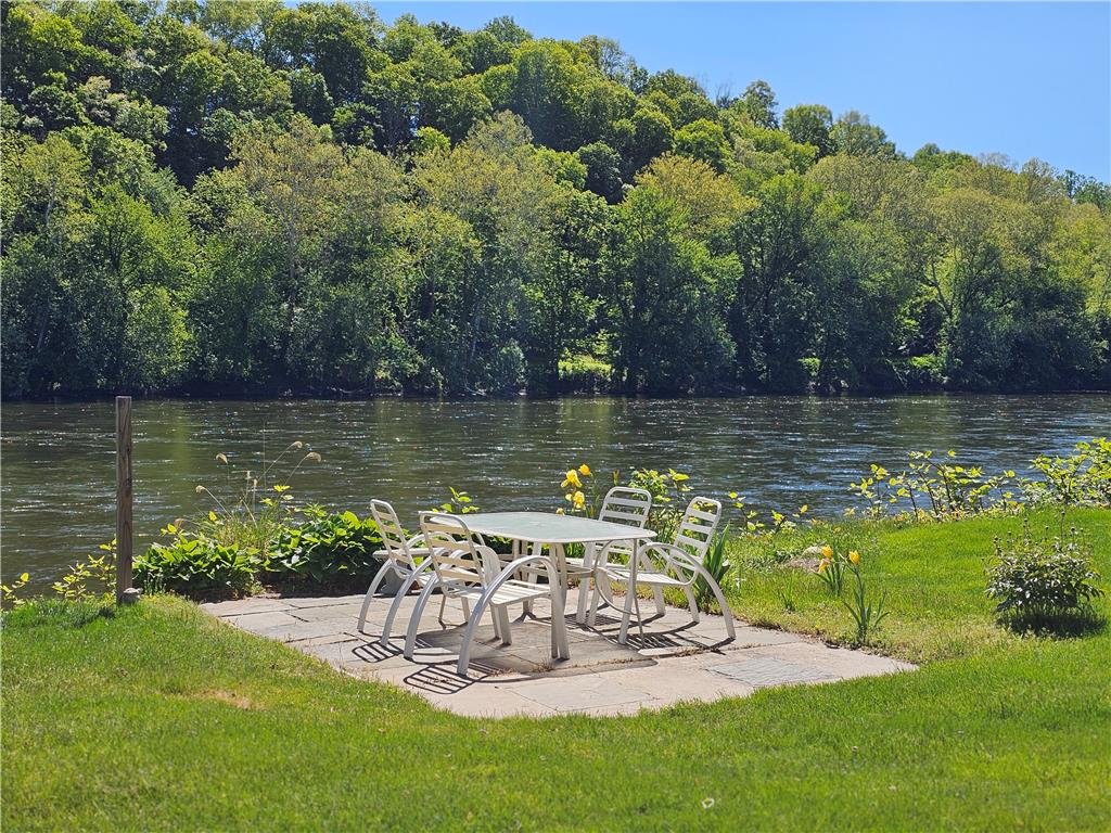 190 Canal Road Easton, PA 18042 - Photo 30 of 39 a view of a swimming pool with a garden and trees