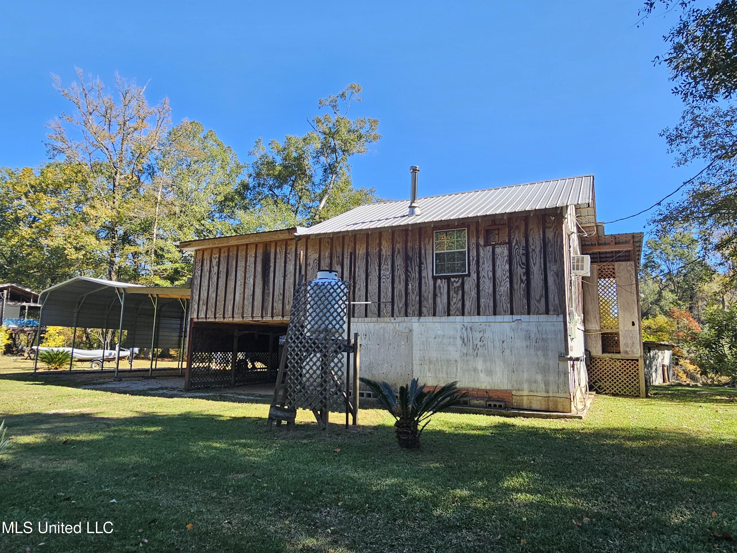 146 Oak Point Road Picayune, MS 39466 - Photo 26 of 40 Right side of home