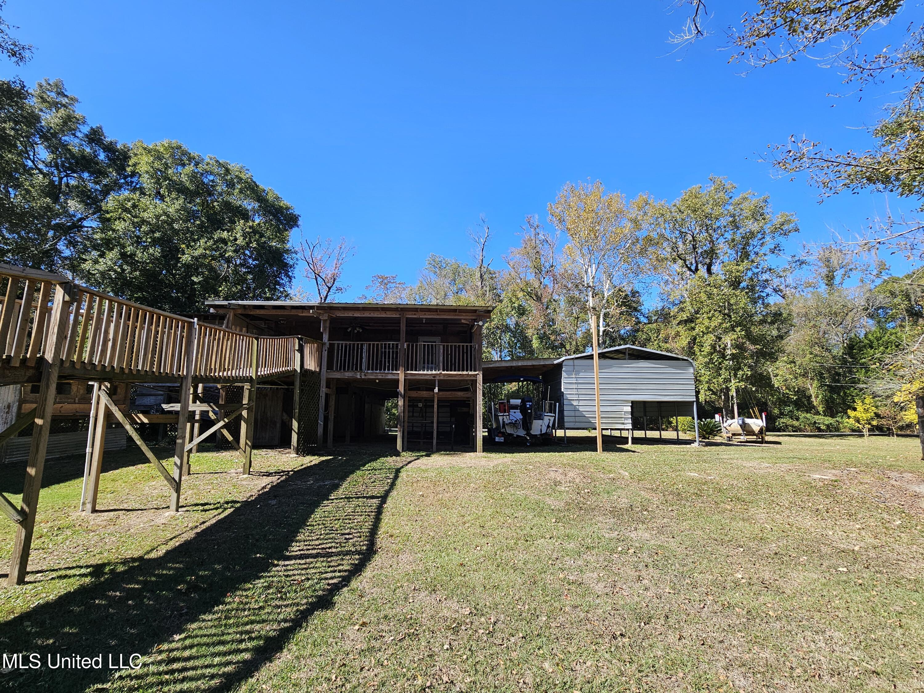 146 Oak Point Road Picayune, MS 39466 - Photo 4 of 40 Walk way and back of home