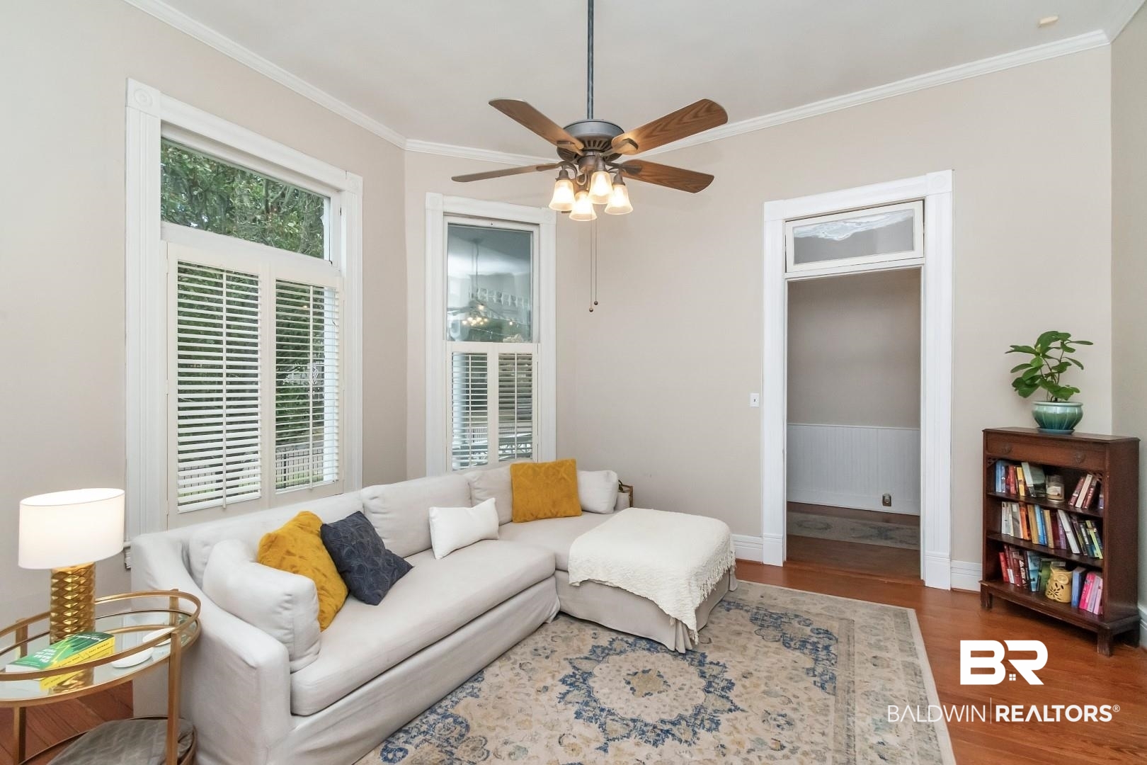 1305 Brown Street Mobile, AL 36604 - Photo 9 of 37 Living room featuring crown molding, wood-type flooring, and ceiling fan