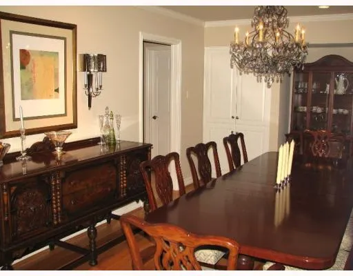 a view of a living room and dining room