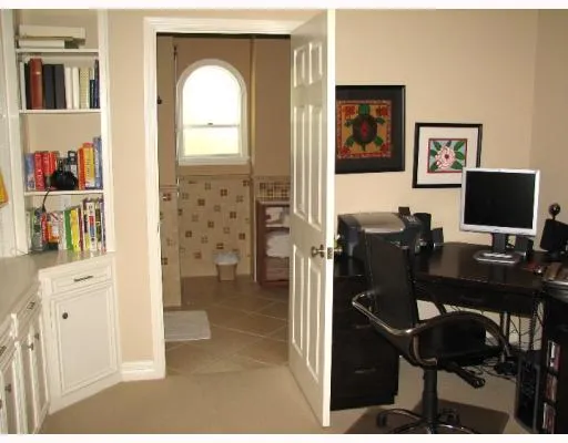 a view of a workspace with furniture