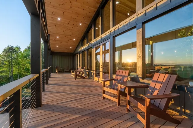 a front view of a building with a yard