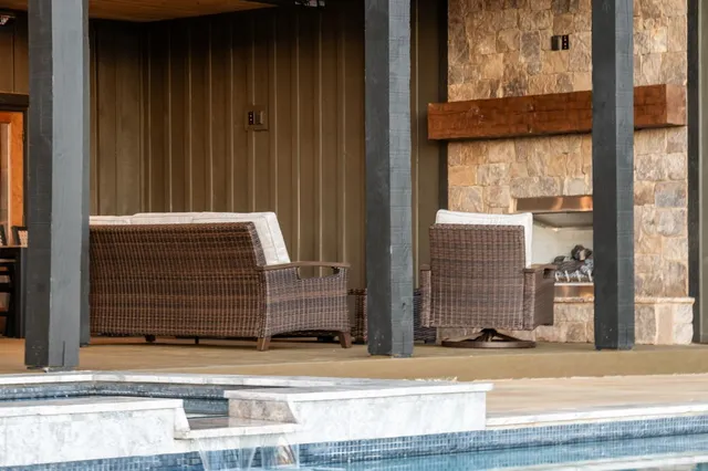 a front view of house with yard and outdoor seating