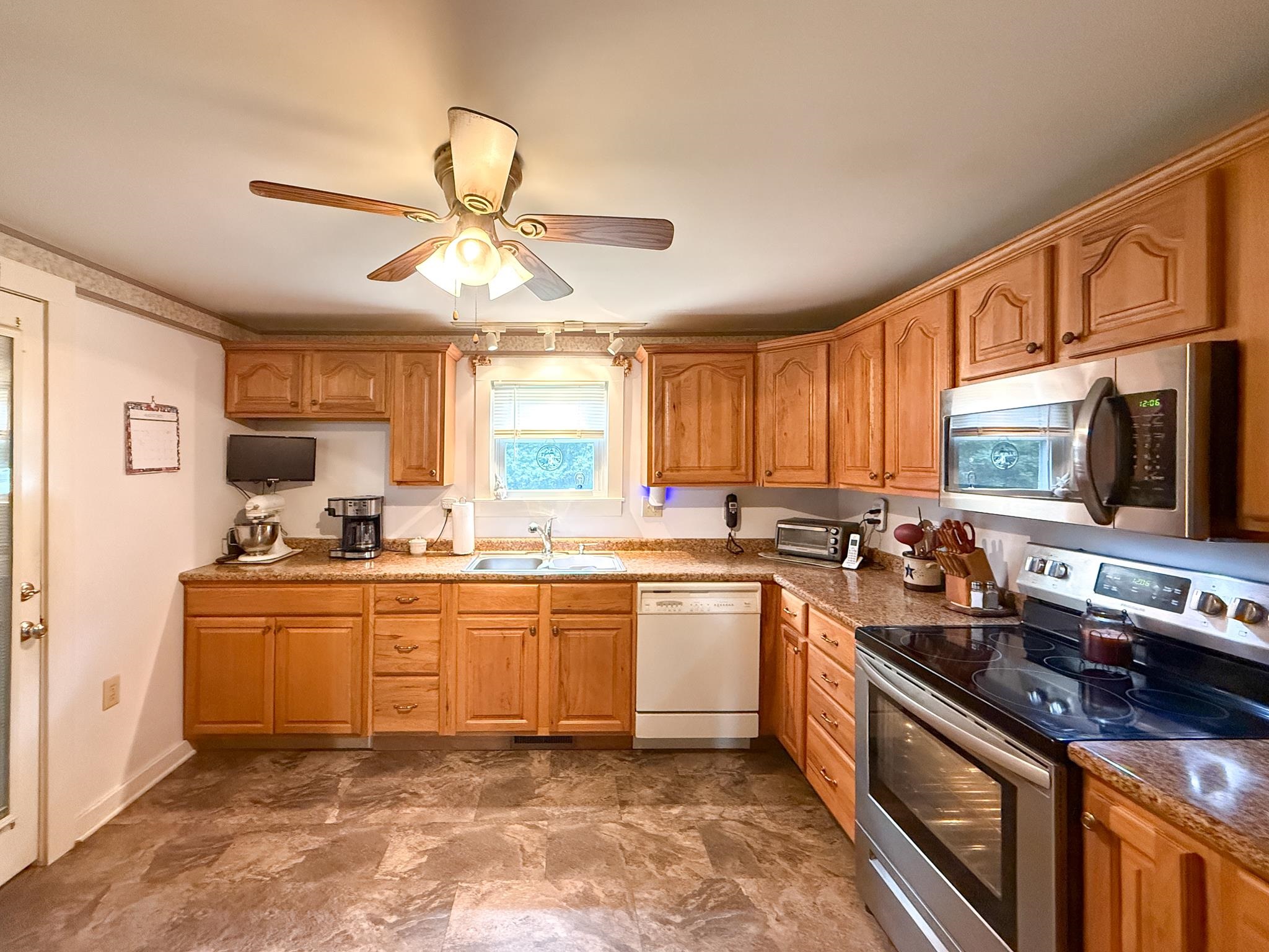 1249 Pounding Creek Road Charlottesville, VA 22903 - Photo 12 of 20 a kitchen with stainless steel appliances granite countertop a sink and stove