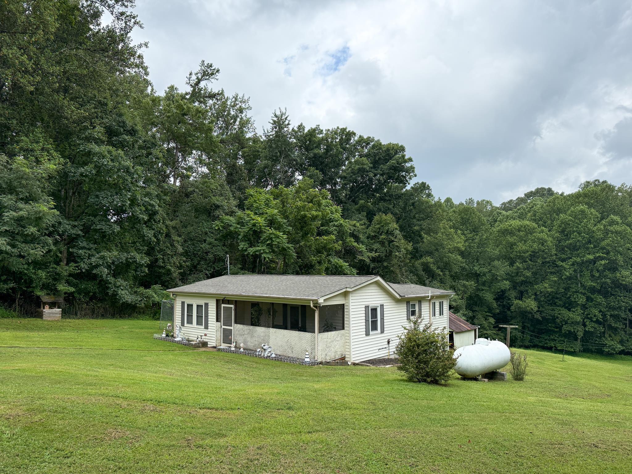 1249 Pounding Creek Road Charlottesville, VA 22903 - Photo 6 of 20 a front view of a house with garden