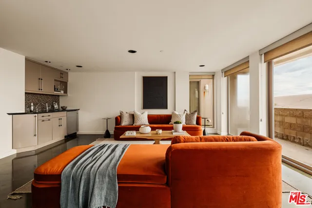 a bed room with a bed and a television