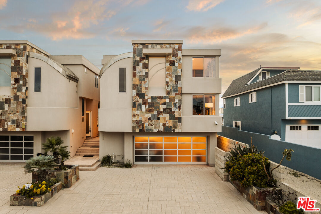 1825 Ocean Drive Oxnard, CA 93035 - Photo 28 of 29 a view of a house with a large windows and a small yard