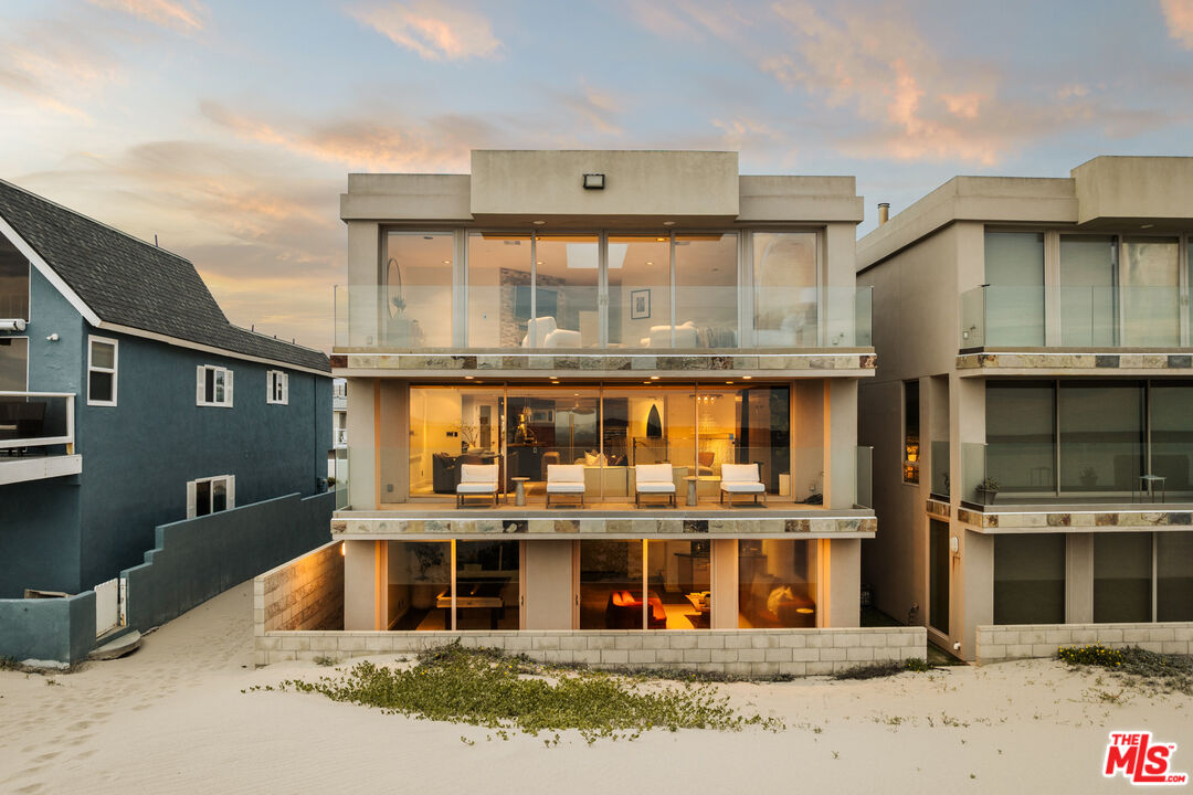 1825 Ocean Drive Oxnard, CA 93035 - Photo 29 of 29 a front view of a house with large windows