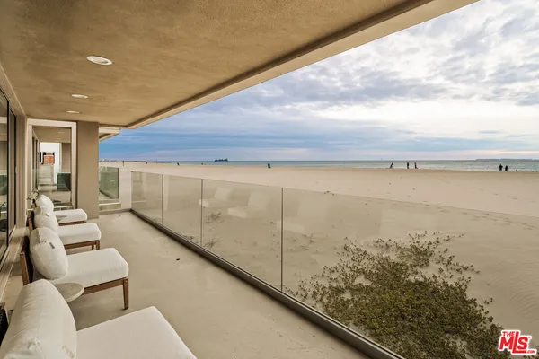 a balcony with view of ocean