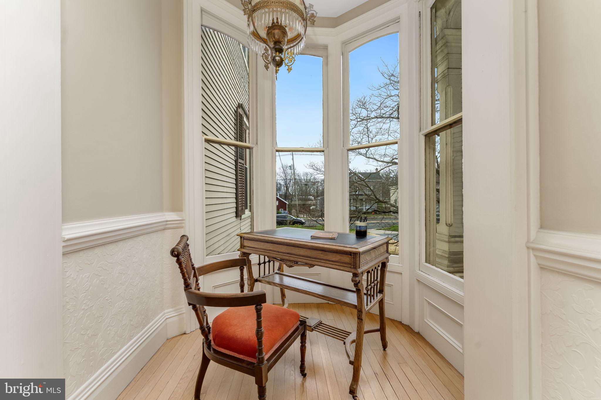 68 West Main Street Clinton, NJ 08809 - Photo 11 of 29 a view of a room that has a window and wooden floor