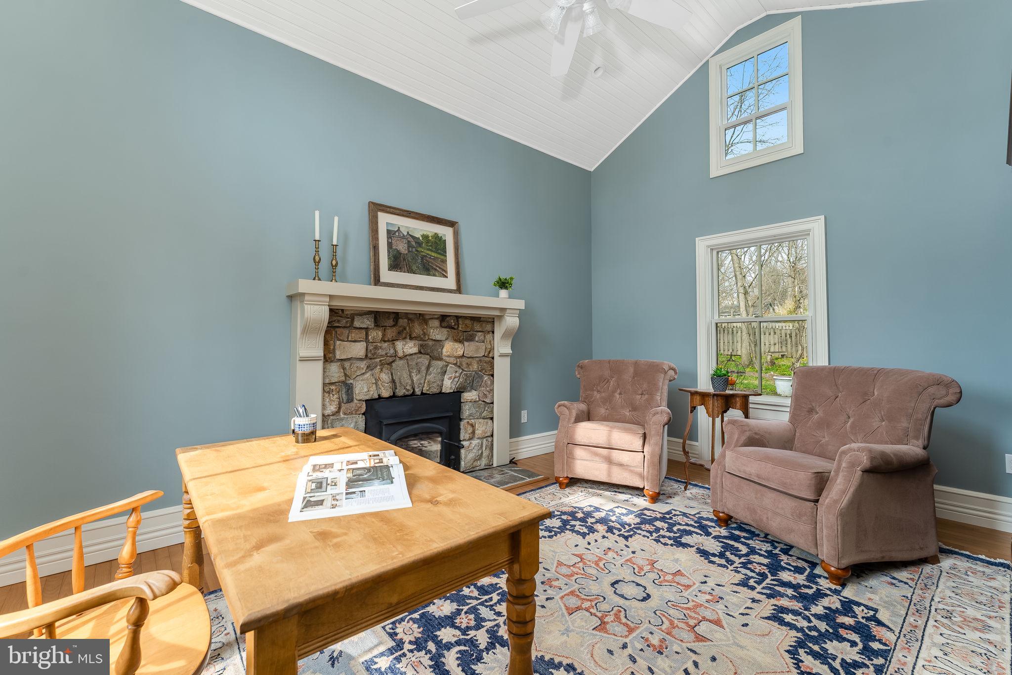 68 West Main Street Clinton, NJ 08809 - Photo 19 of 29 a living room with furniture and a fireplace