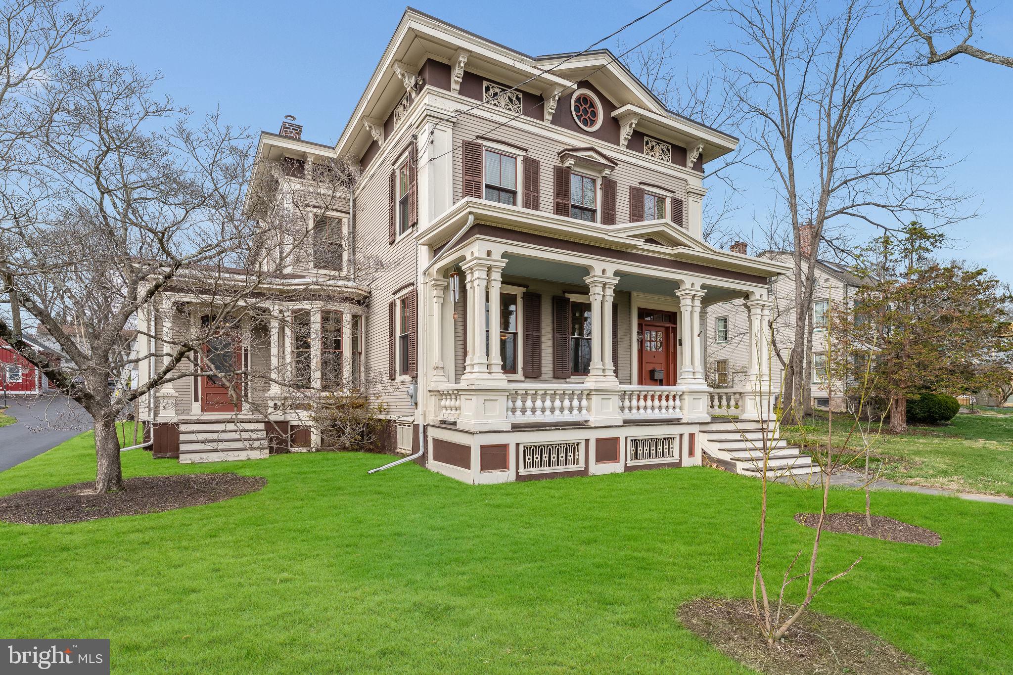 68 West Main Street Clinton, NJ 08809 - Photo 2 of 29 a front view of a building with a yard
