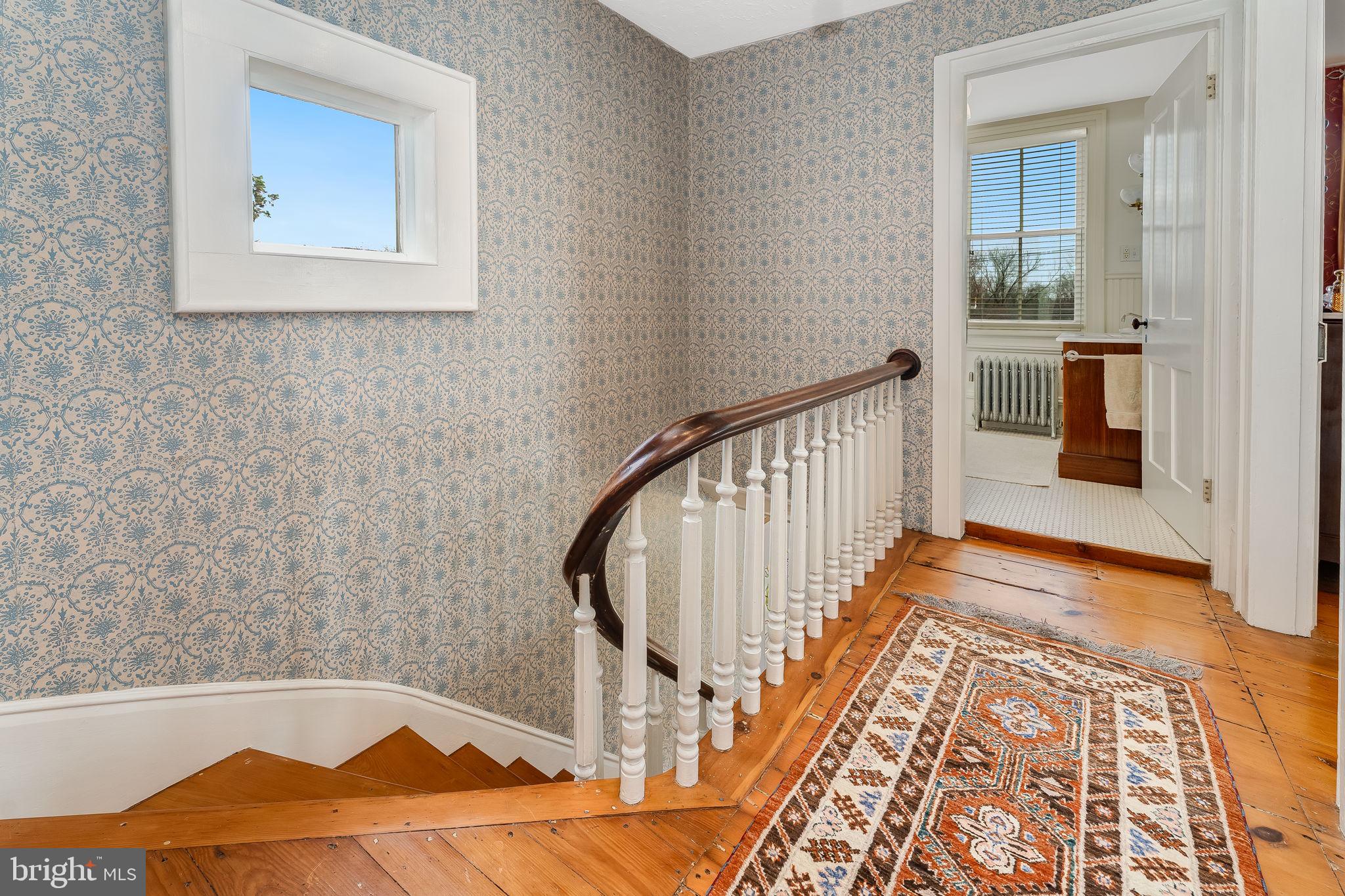 68 West Main Street Clinton, NJ 08809 - Photo 21 of 29 a view of a hallway with wooden floor and entryway