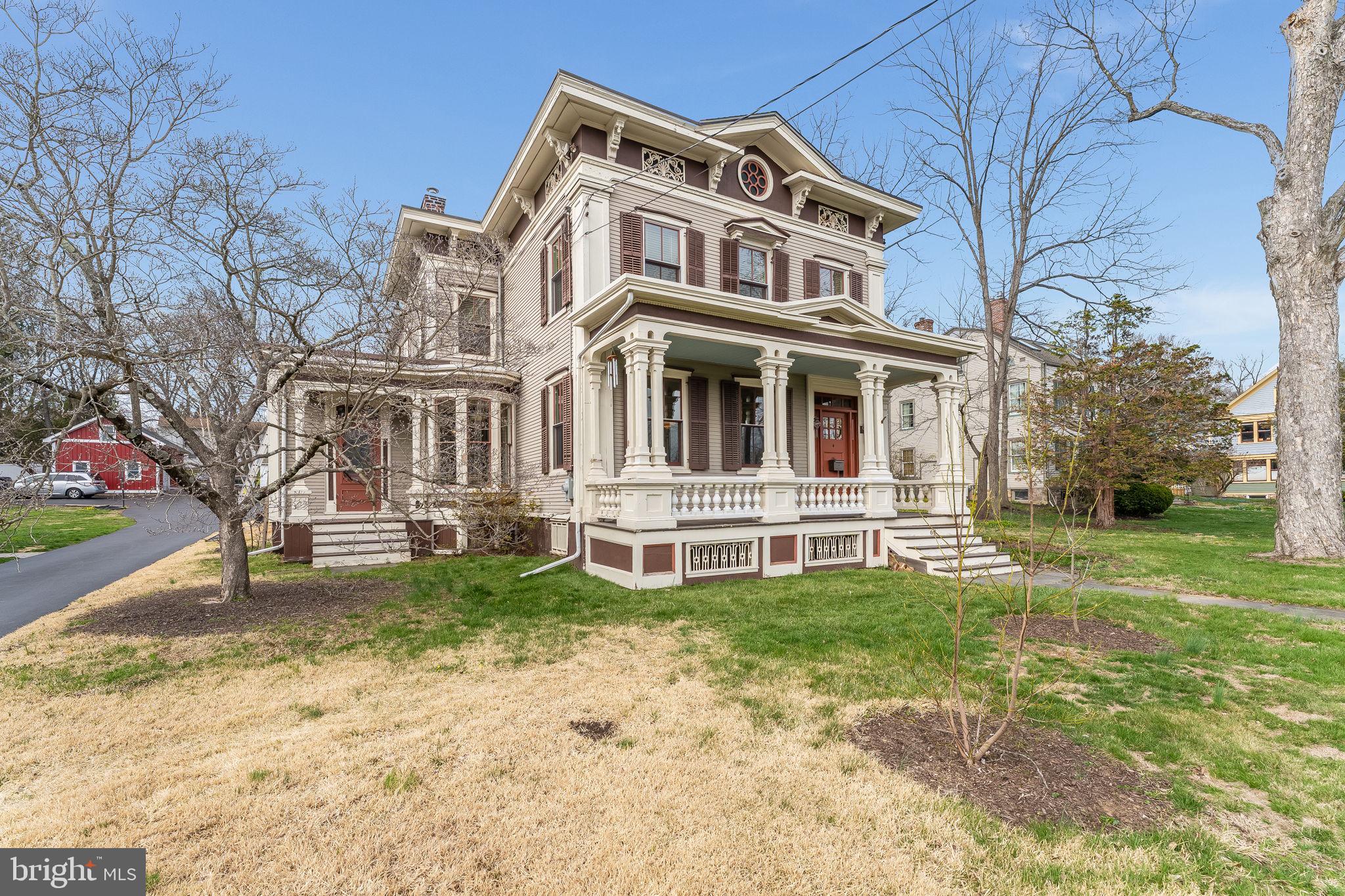 68 West Main Street Clinton, NJ 08809 - Photo 28 of 29 a view of a house with a yard and sitting area