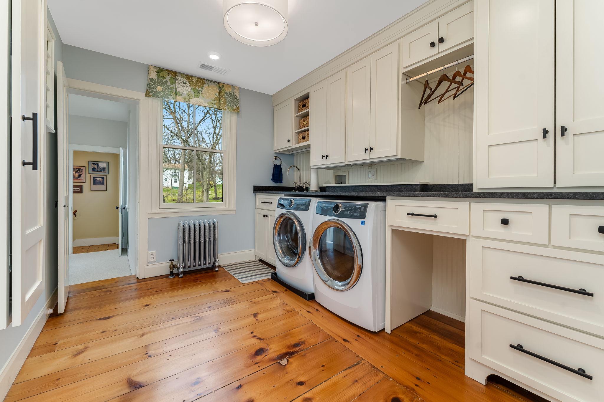68 West Main Street Clinton, NJ 08809 - Photo 29 of 29 a utility room with sink dryer and washer