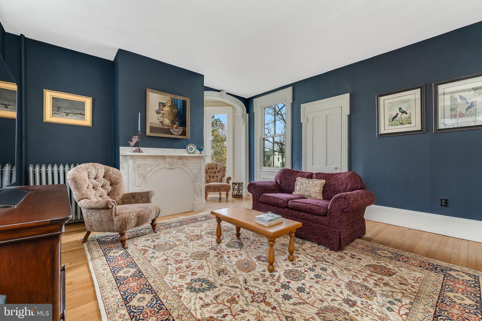 68 West Main Street Clinton, NJ 08809 - Photo 7 of 29 a living room with furniture and a rug