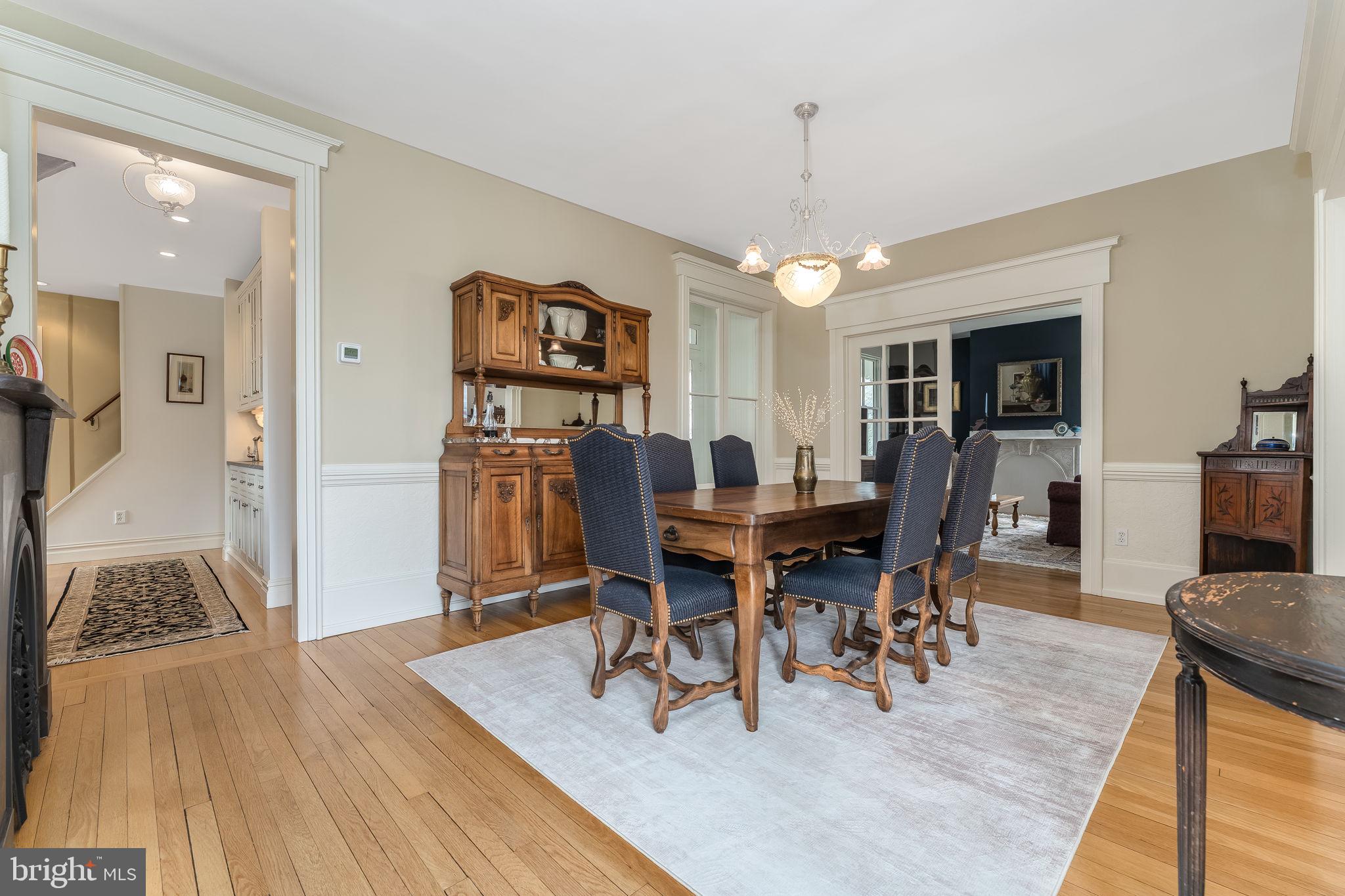 68 West Main Street Clinton, NJ 08809 - Photo 9 of 29 a view of a dining room with furniture window and wooden floor