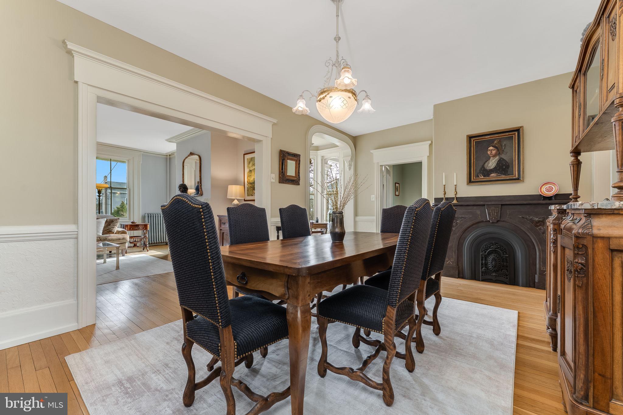 68 West Main Street Clinton, NJ 08809 - Photo 10 of 29 a view of a dining room with furniture and wooden floor