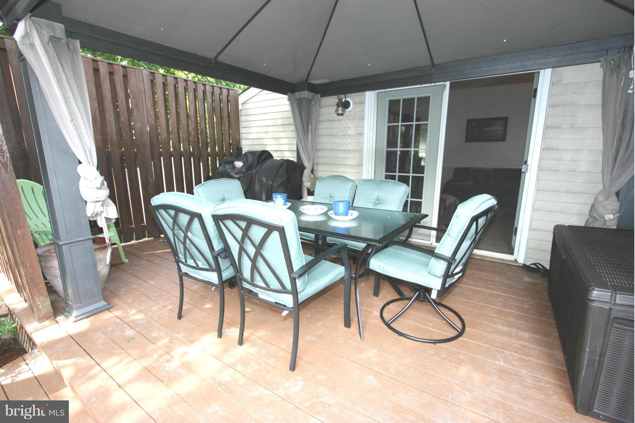 8644 Heathermill Road Nottingham, MD 21236 - Photo 25 of 30 COVERED DECK IS ADJACENT TO FAMILY ROOM