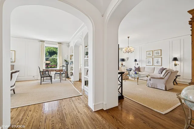 a living room with furniture and a table