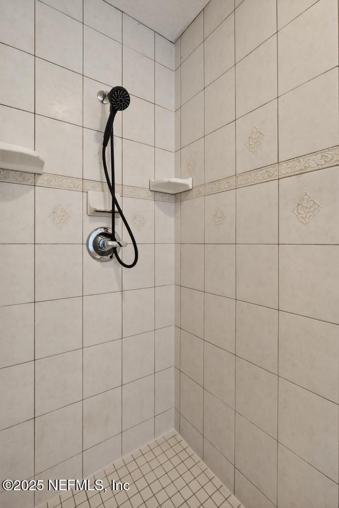 53 Tallwood Road Jacksonville Beach, FL 32250 - Photo 44 of 62 a bathroom with a shower