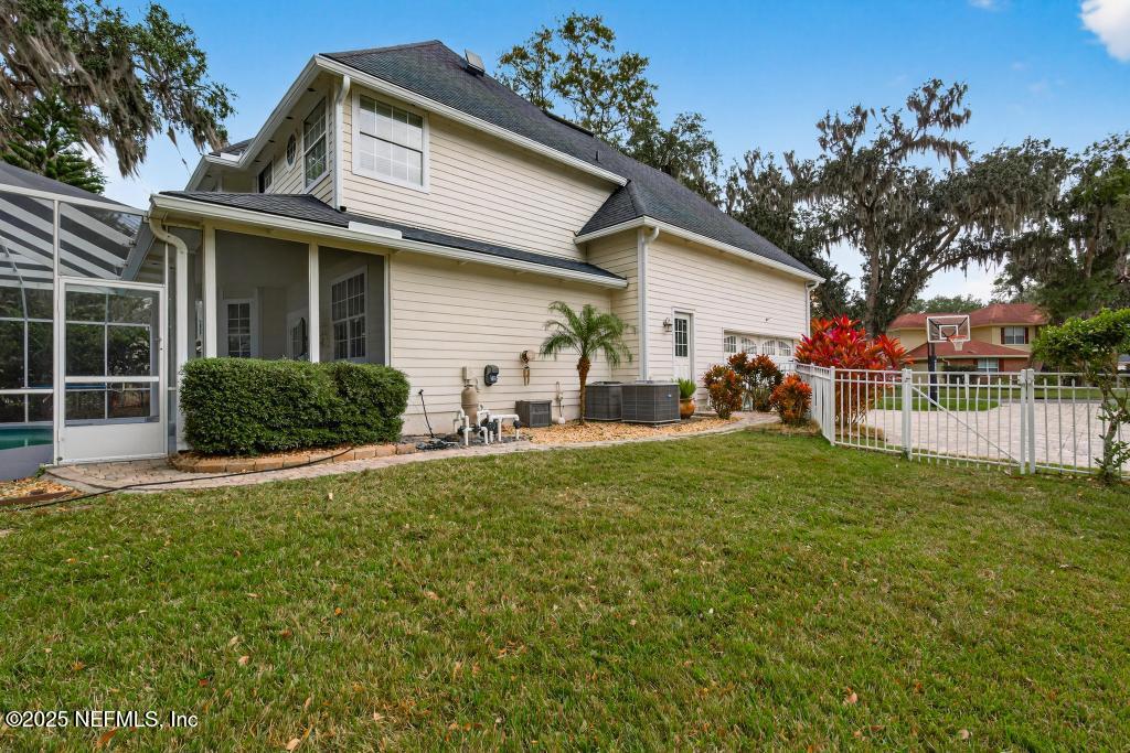 53 Tallwood Road Jacksonville Beach, FL 32250 - Photo 62 of 62 front view of a house with a yard