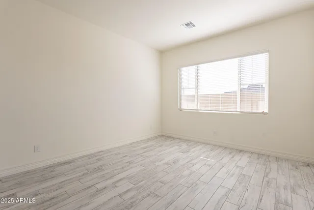 an empty room with an entryway